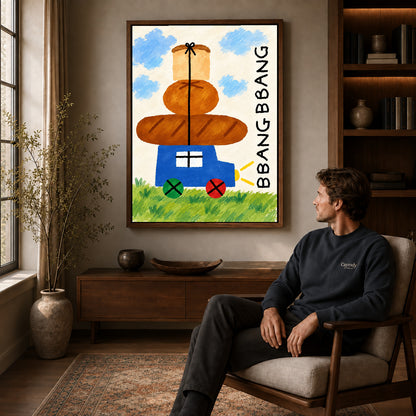 bread cart parade canvas art in a walnut frame above a console beside a seated man.