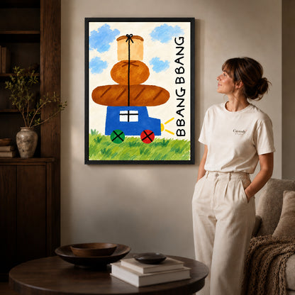 bread cart parade canvas art in a black frame beside a woman and round wooden table.