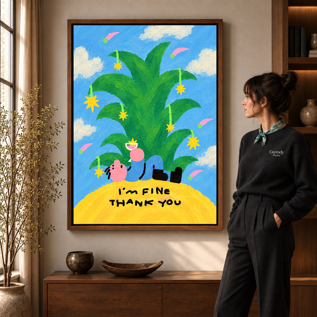 fine thank you canvas art in a walnut frame beside a standing woman and wooden console.