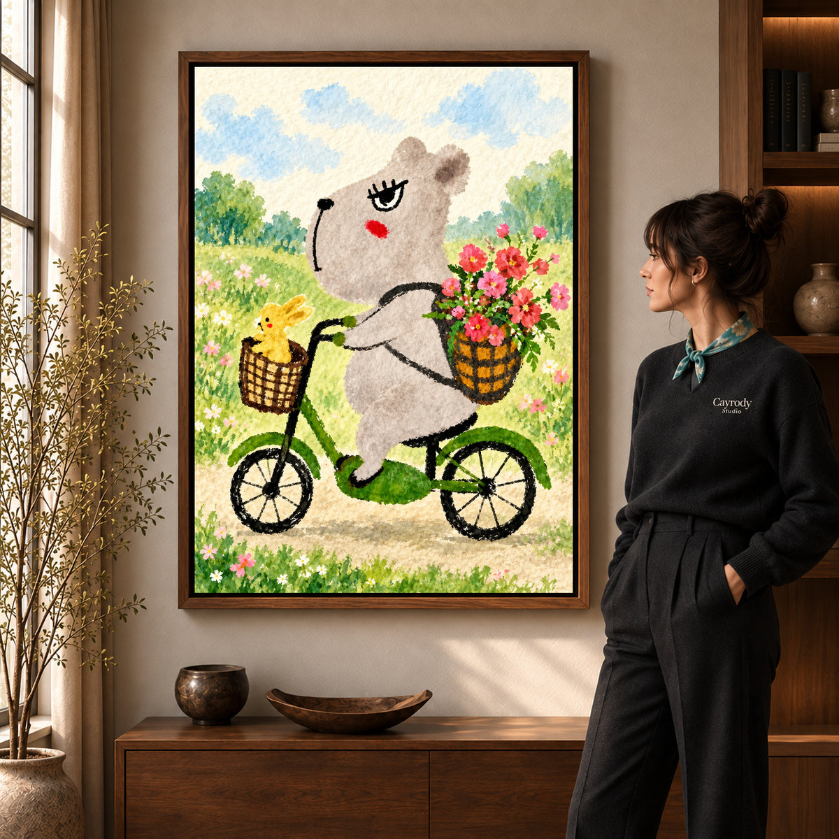 capybara bicycle ride canvas art shown in the walnut frame option within a warm living room.