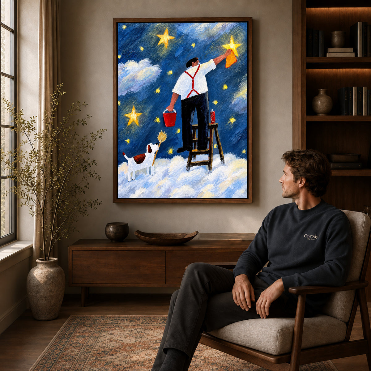 polishing stars together canvas art in a walnut frame above a console beside a seated man.