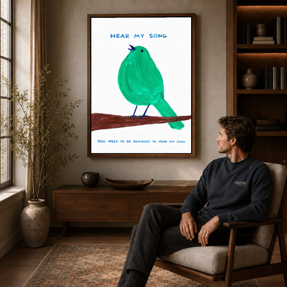 hear my song canvas art in a walnut frame above a console beside a seated man.