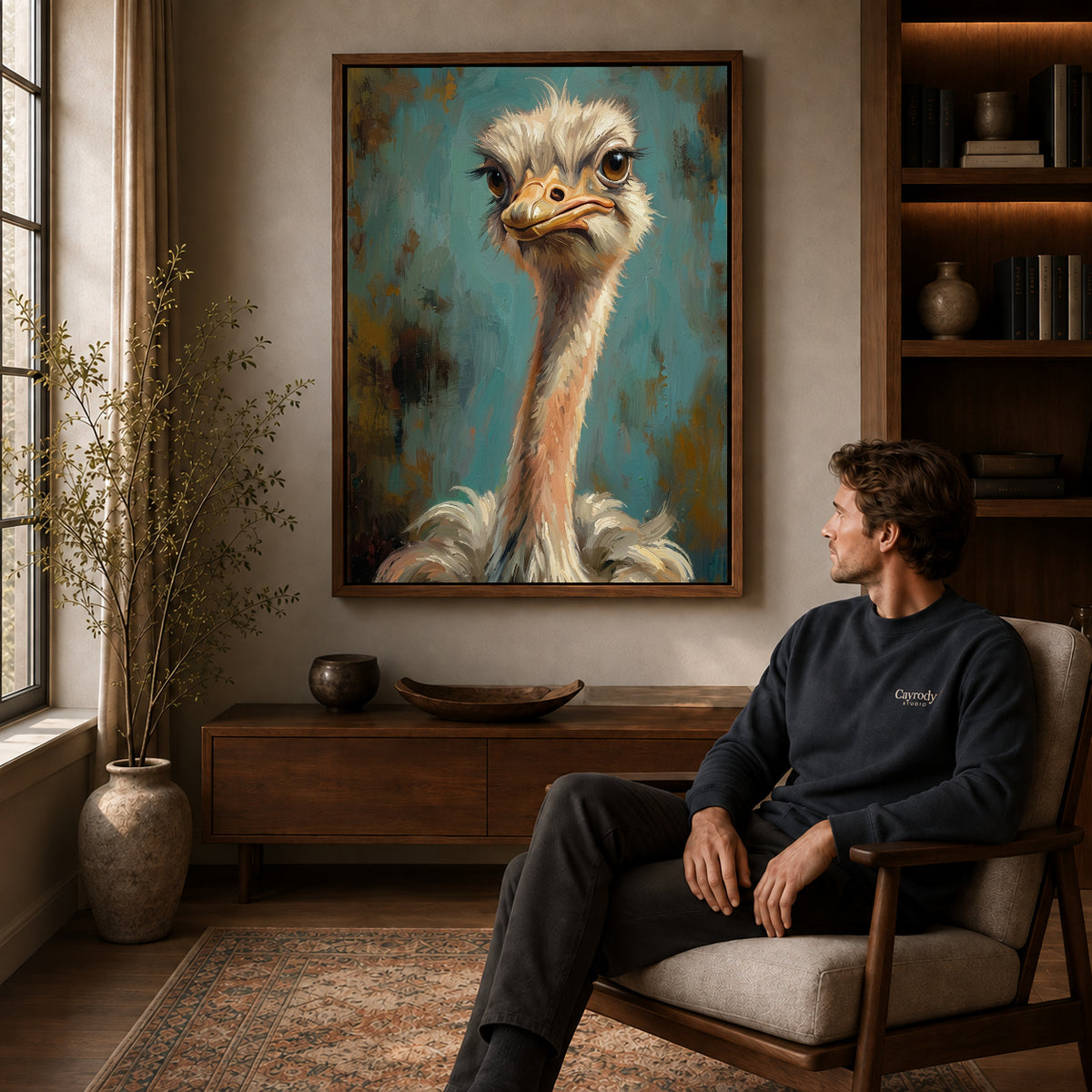 Walnut framed expressive ostrich portrait canvas art displayed above a seated man in a wood furnished room.