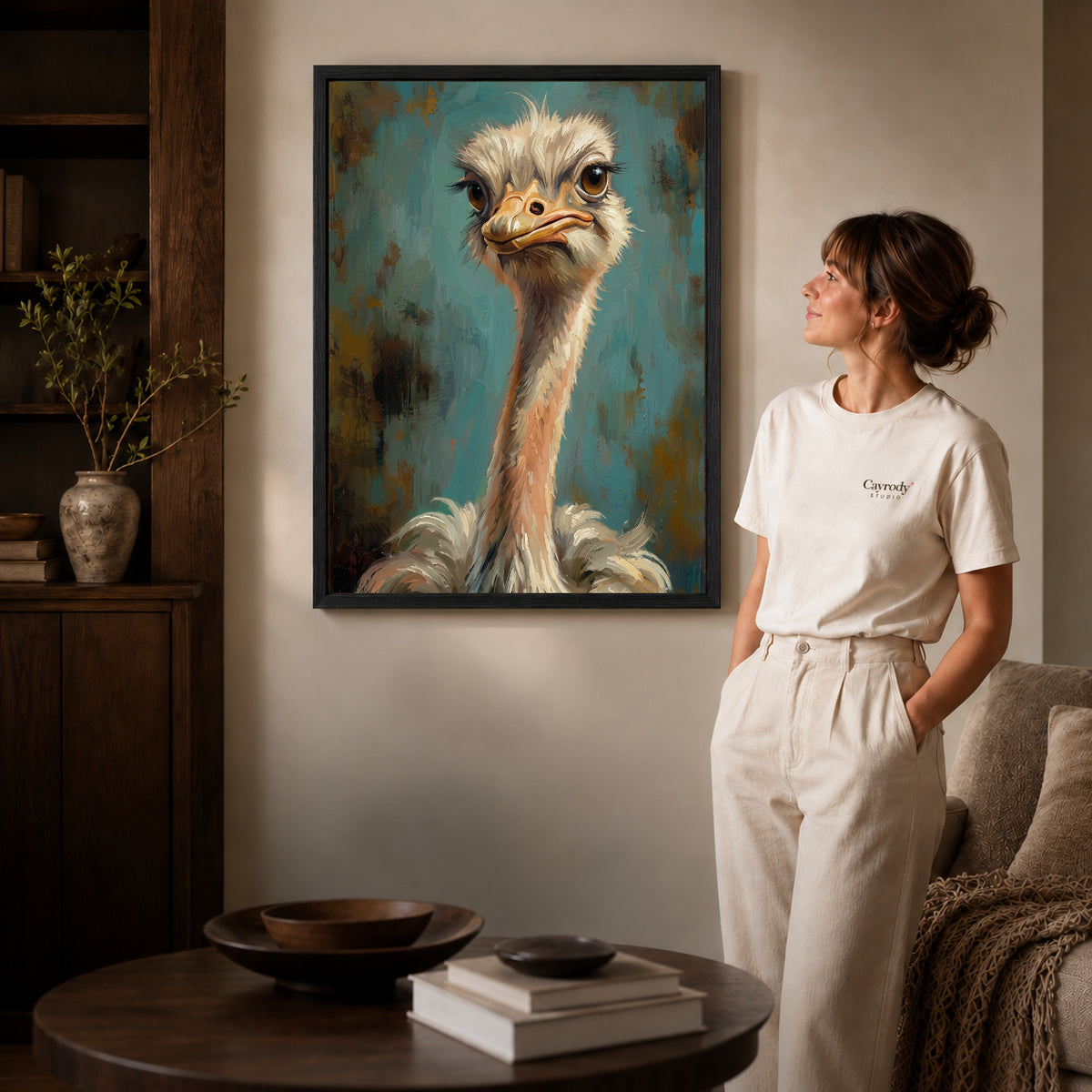 Black framed expressive ostrich portrait canvas art room scene assigned to all six black framed canvas sizes.