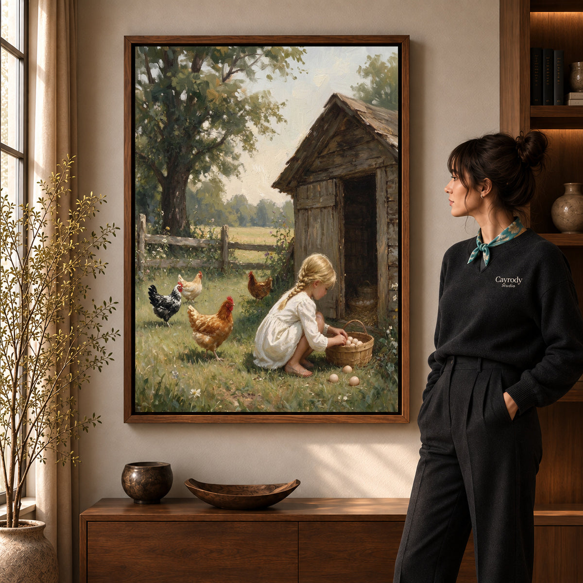 Girl gathering eggs canvas art in a walnut frame beside a standing woman in a warm living room.