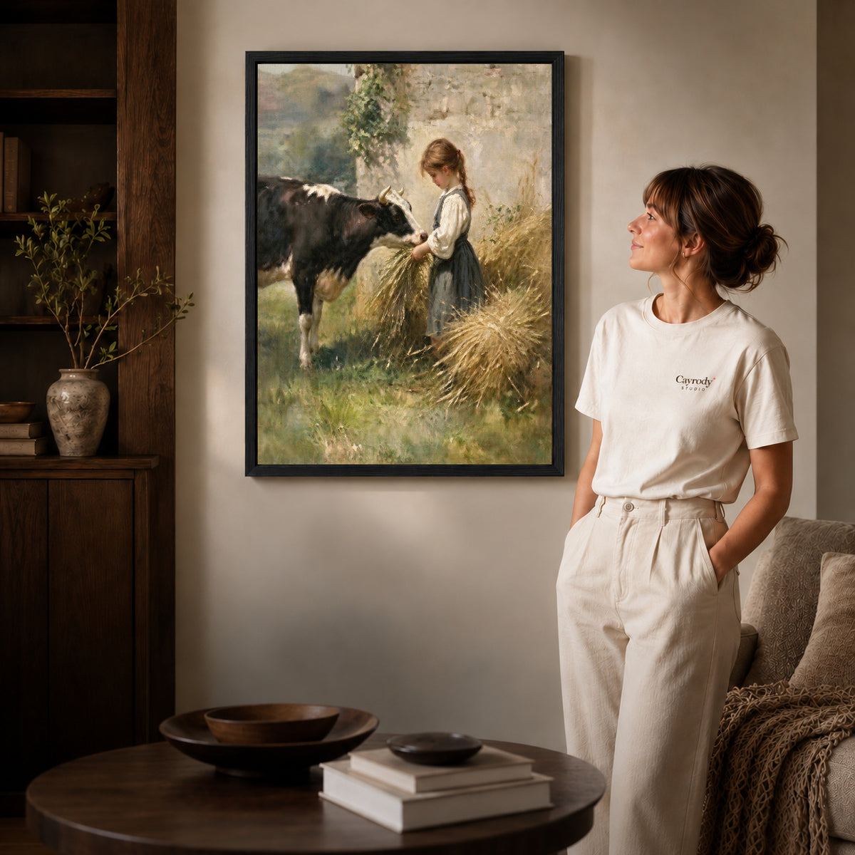 Black framed girl feeding cow canvas art room scene assigned to all six black framed canvas sizes.