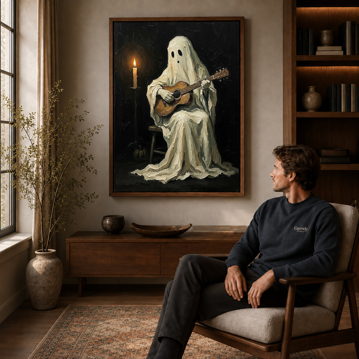 Walnut framed ghost guitarist canvas art displayed above a seated man in a wood furnished living room.