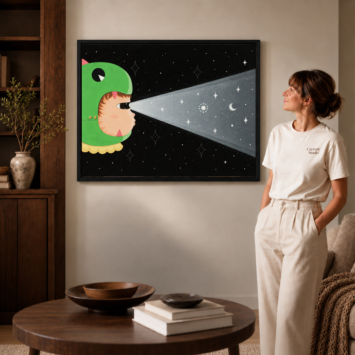 Black framed dinosaur hood cat artwork scene assigned to all six black framed canvas sizes.