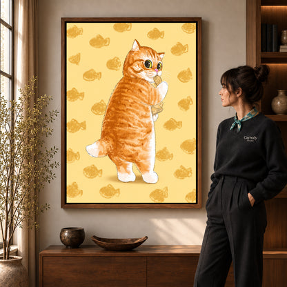 Ginger kitten canvas art in a walnut frame beside a standing woman in a warm living room.