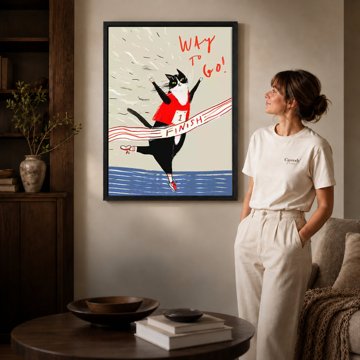 Black framed running cat canvas art room scene assigned to all six black framed canvas sizes.