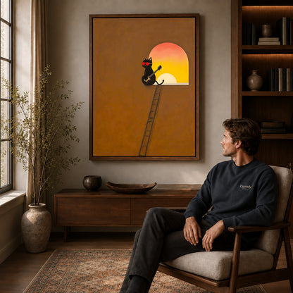 Walnut framed musician cat canvas art displayed above a seated man in a wood furnished living room.