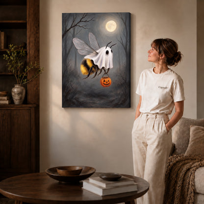 Gallery wrapped ghost costume bee canvas art with naturally shaded canvas edges beside a woman wearing cream clothing.