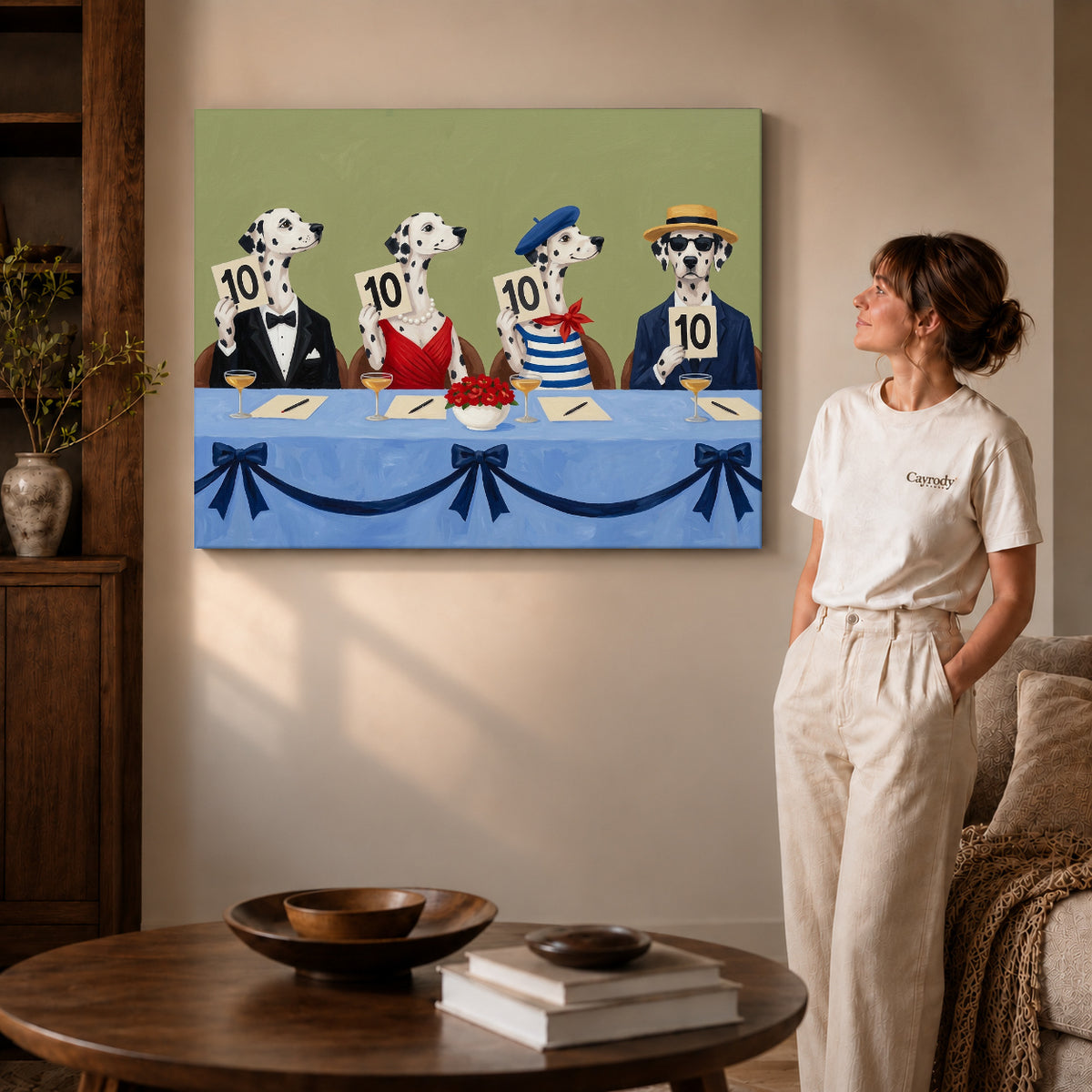 Gallery wrapped dalmatian judging panel canvas art with naturally shaded canvas edges beside a woman wearing cream clothing.