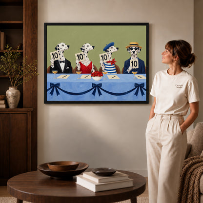 Black framed dalmatian judging panel canvas art displayed beside a woman in a warm neutral living room.