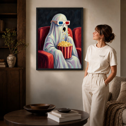 Black framed cinema ghost surprise artwork beside a woman in a warm neutral living room.