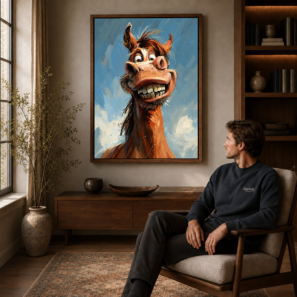 Walnut framed grinning horse portrait artwork above a seated man in a wood furnished living room.