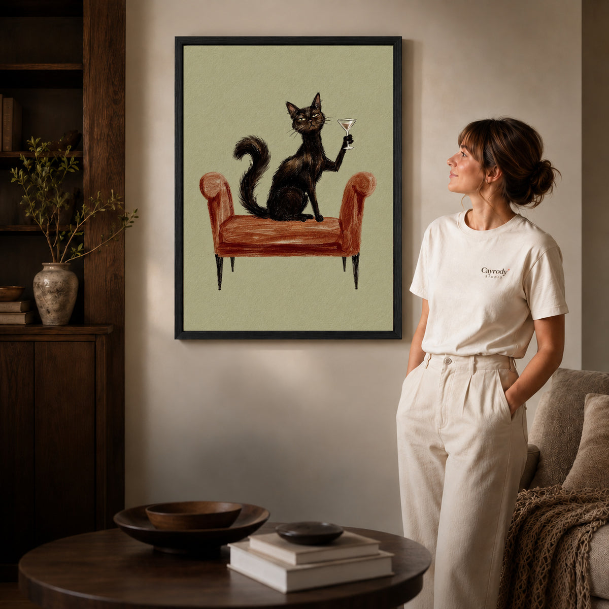 Black framed armchair cocktail cat artwork scene assigned to all six black framed canvas sizes.