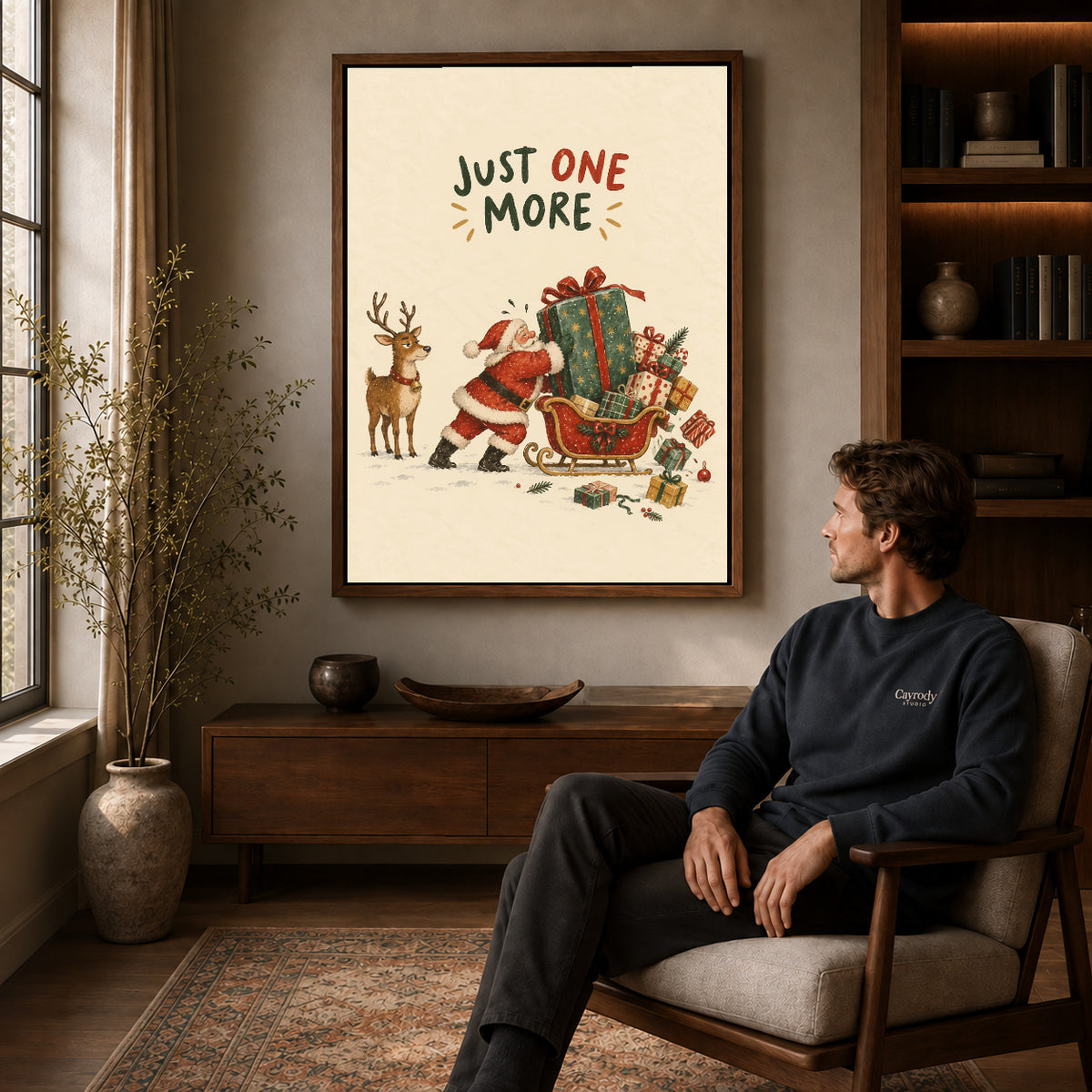 Walnut framed one more gift artwork above a seated man in a wood furnished living room.
