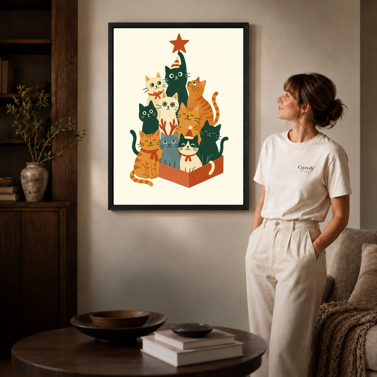 Black framed christmas cat gathering artwork scene assigned to all six black framed canvas sizes.