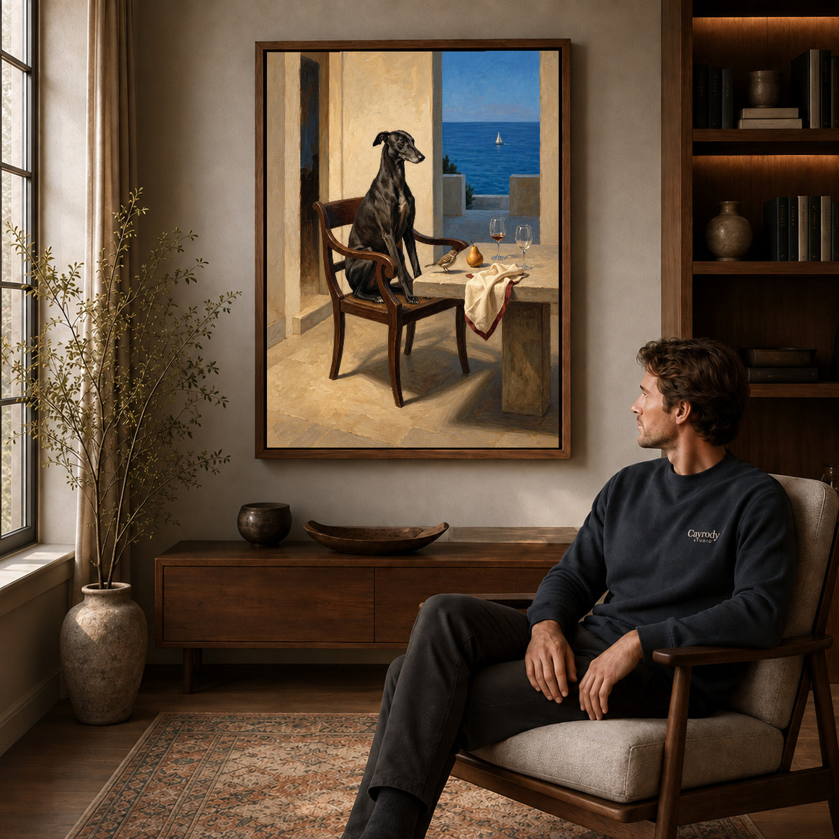 Walnut framed seaside greyhound portrait artwork above a seated man in a wood furnished living room.