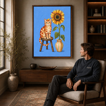 Walnut framed sunflower cat portrait artwork above a seated man in a wood furnished living room.