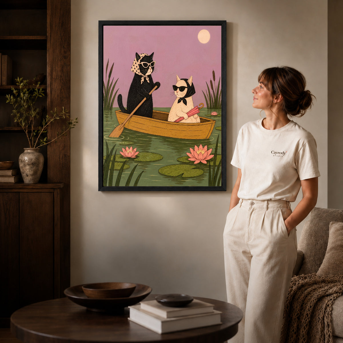 Black framed boat cat friends artwork scene assigned to all six black framed canvas sizes.