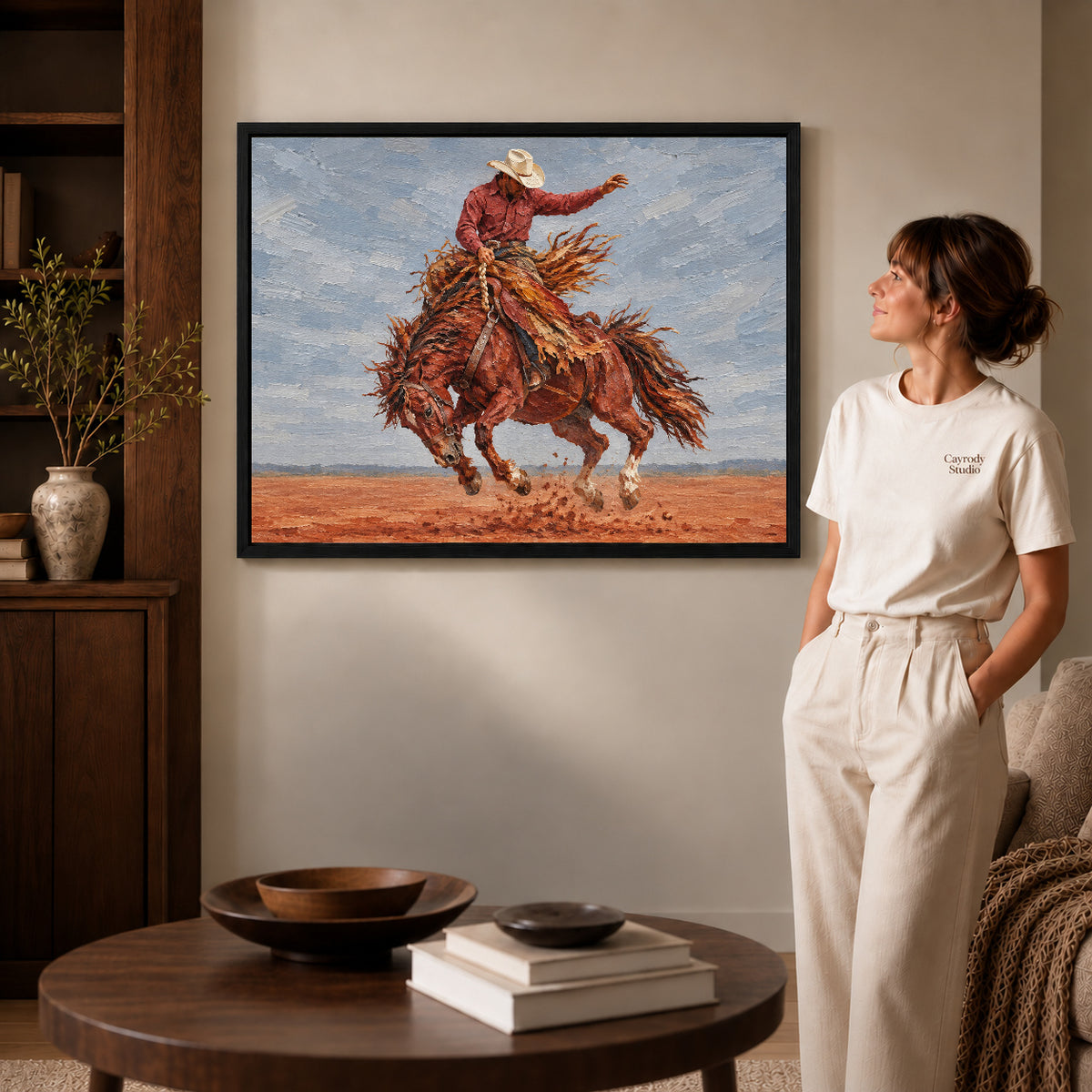 Black framed bucking horse rider artwork scene assigned to all six black framed canvas sizes.