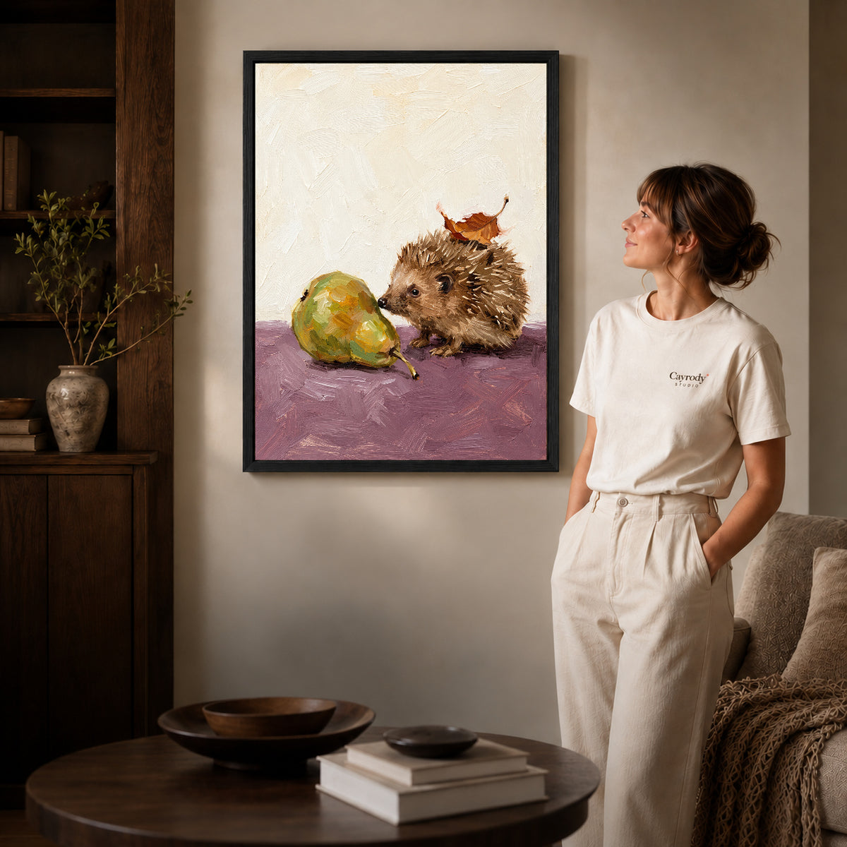 Black framed hedgehog and pear artwork scene assigned to all six black framed canvas sizes.