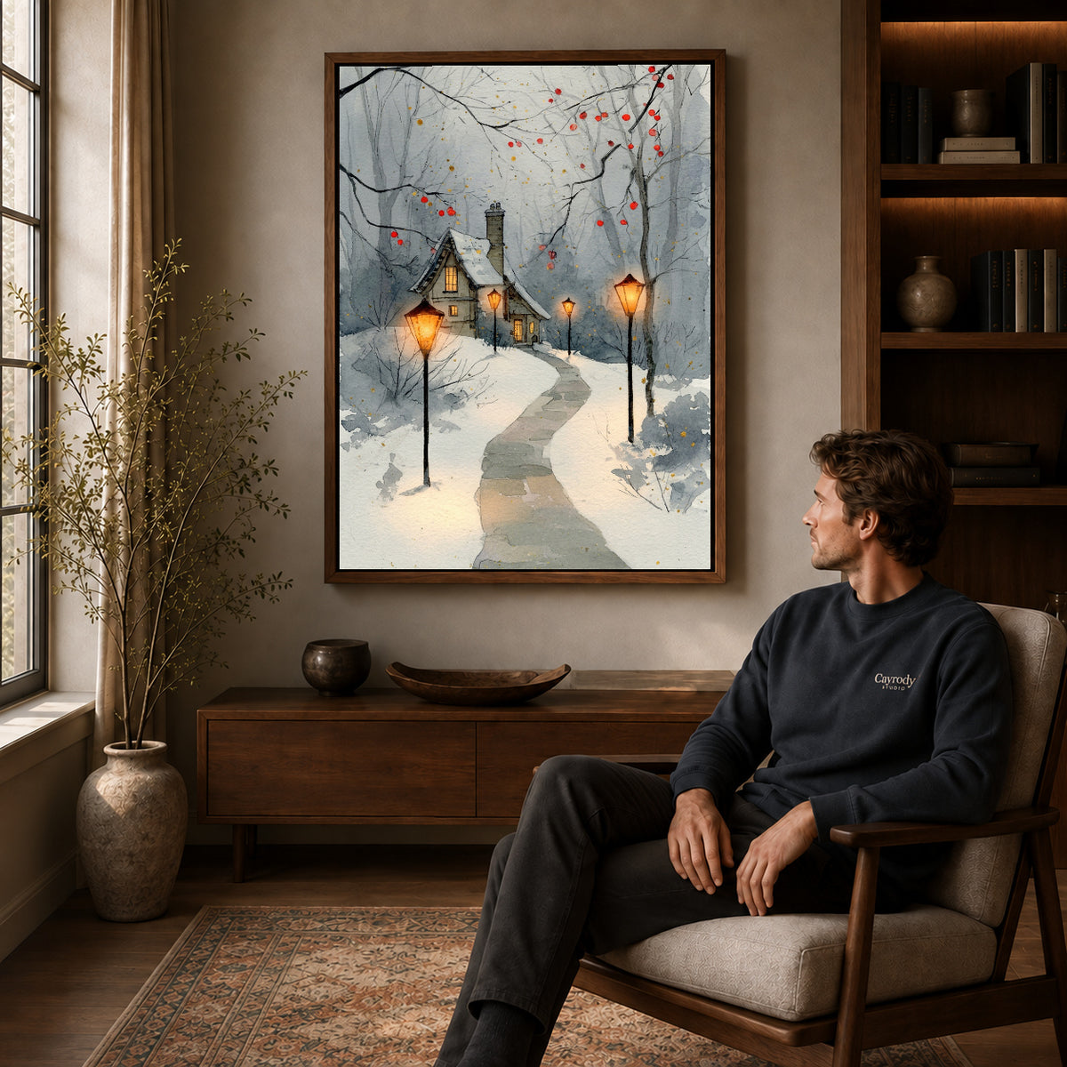 Walnut framed snowy cottage lights artwork above a seated man in a wood furnished living room.