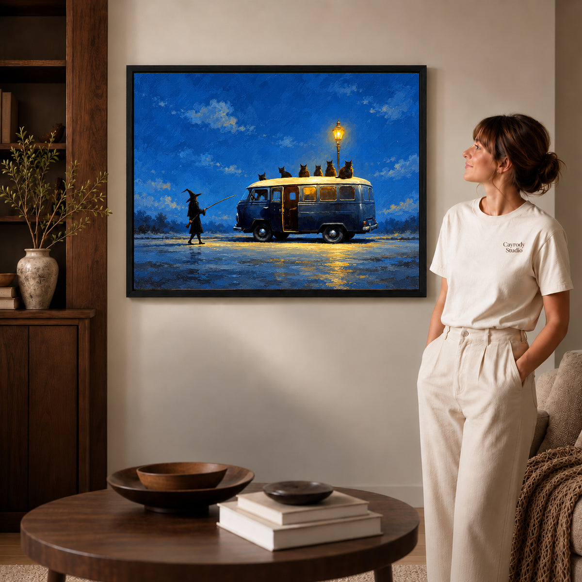 Black framed witch cat van artwork scene assigned to all six black framed canvas sizes.