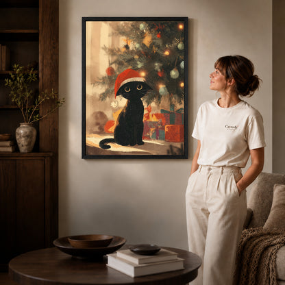 Black framed cozy christmas cat artwork scene assigned to all six black framed canvas sizes.