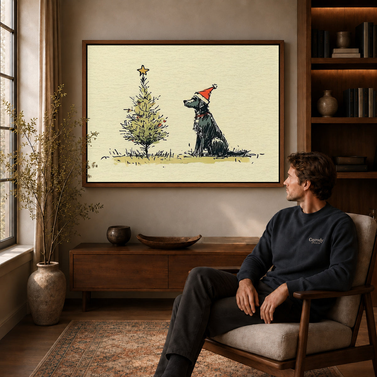 Walnut framed christmas dog sketch artwork above a seated man in a wood furnished living room.