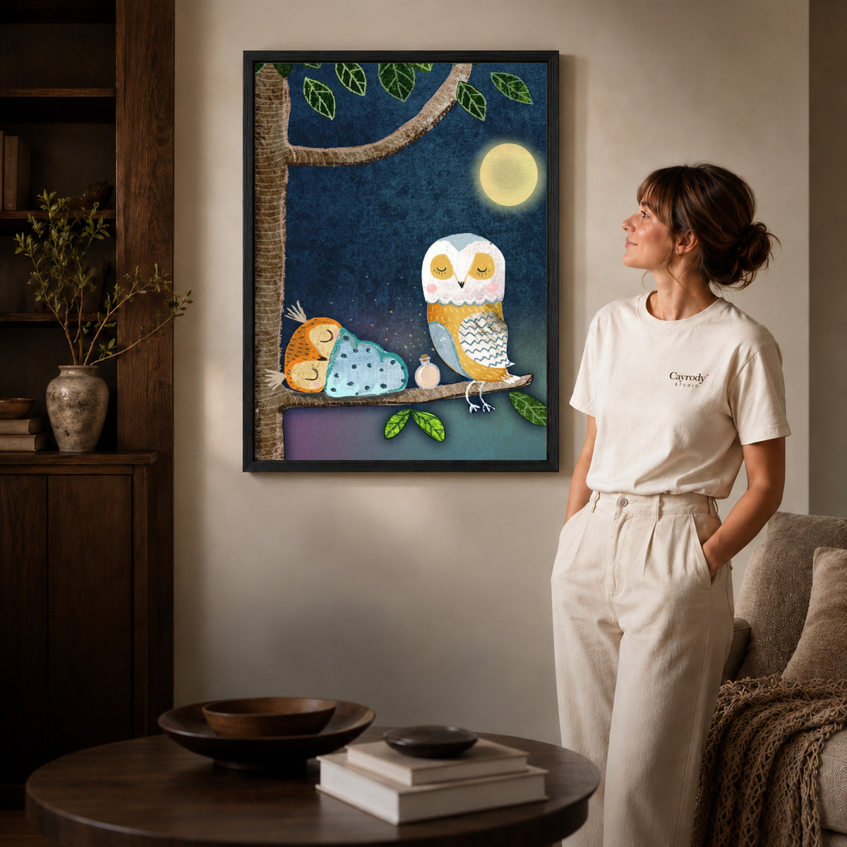 Black framed moonlit owl family artwork scene assigned to all six black framed canvas sizes.