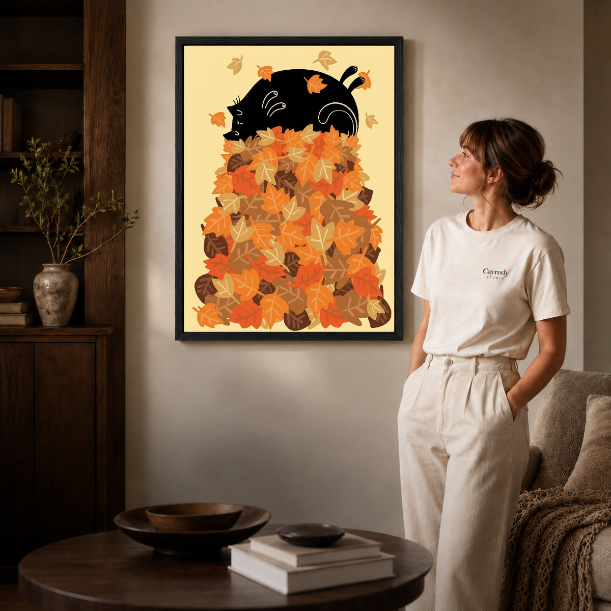Black framed autumn leaf cat artwork scene assigned to all six black framed canvas sizes.