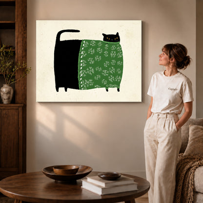 Gallery wrapped snowflake sweater cat artwork with shaded canvas edges beside a woman wearing cream clothing.