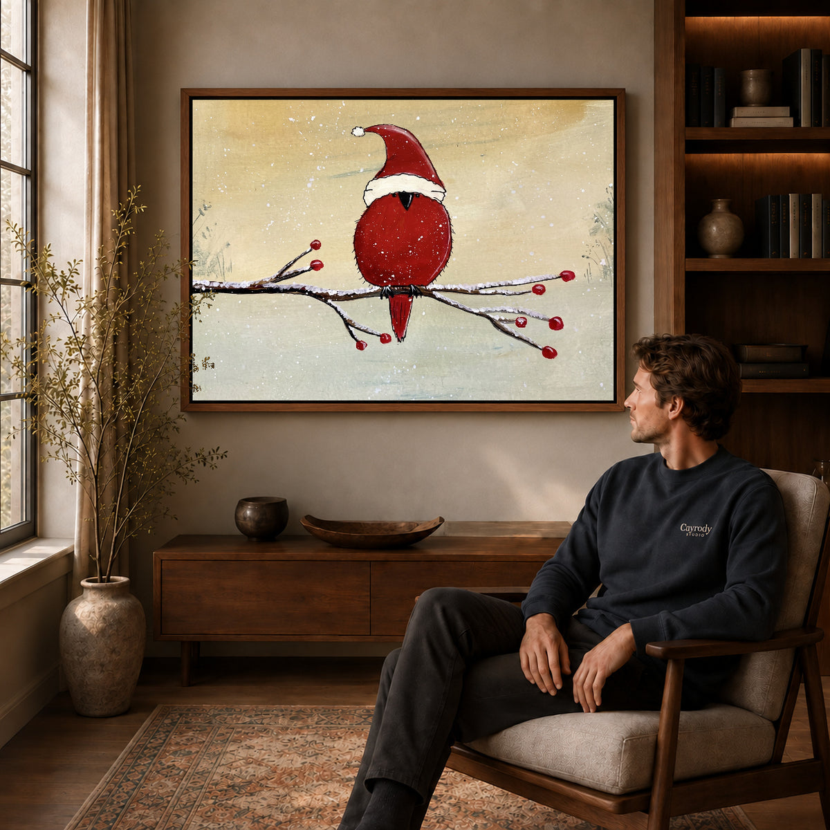 Walnut framed christmas cardinal artwork above a seated man in a wood furnished living room.