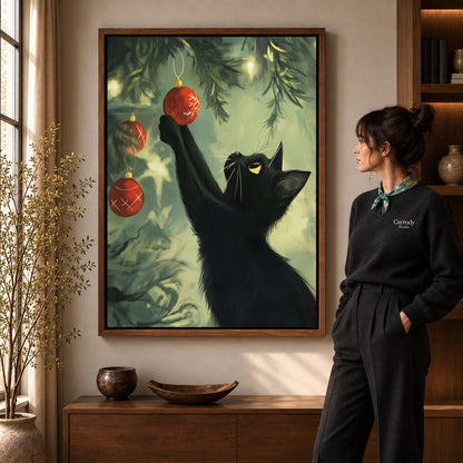Christmas Bauble Cat artwork in a walnut frame beside a standing woman in a warm room.