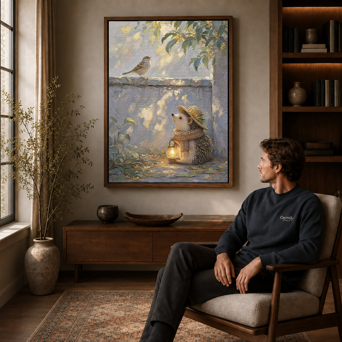 Walnut framed hedgehog lantern walk artwork above a seated man in a wood furnished living room.