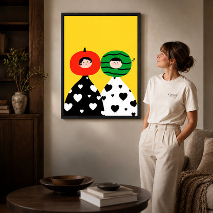 Black framed fruit head couple artwork beside a woman in a warm neutral living room.