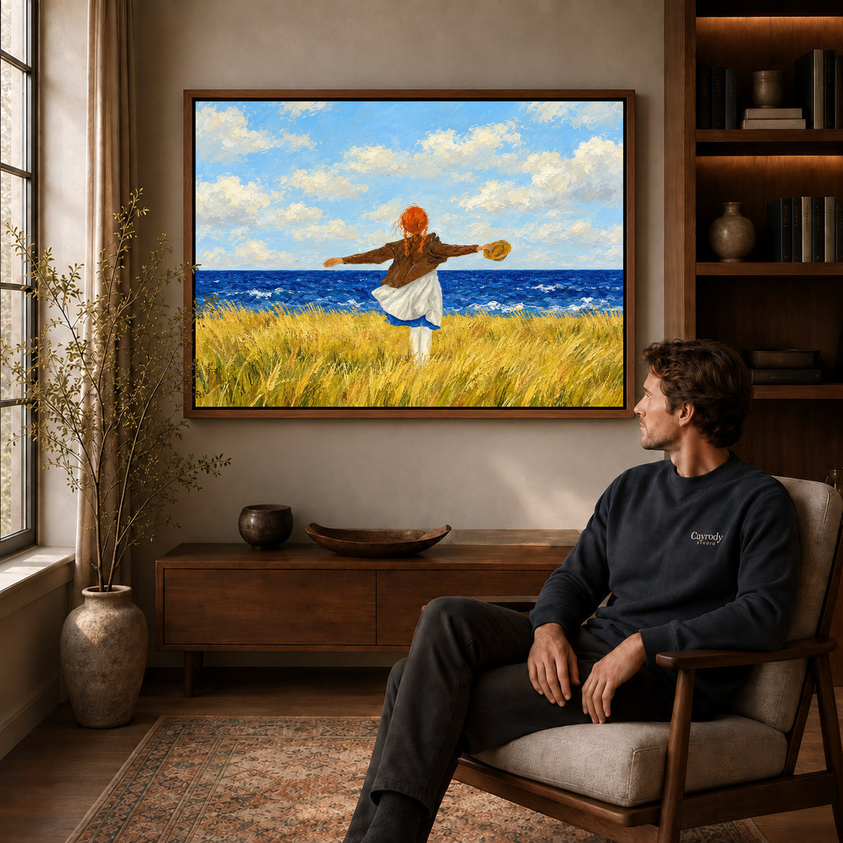 Walnut framed seaside freedom artwork above a seated man in a wood furnished living room.