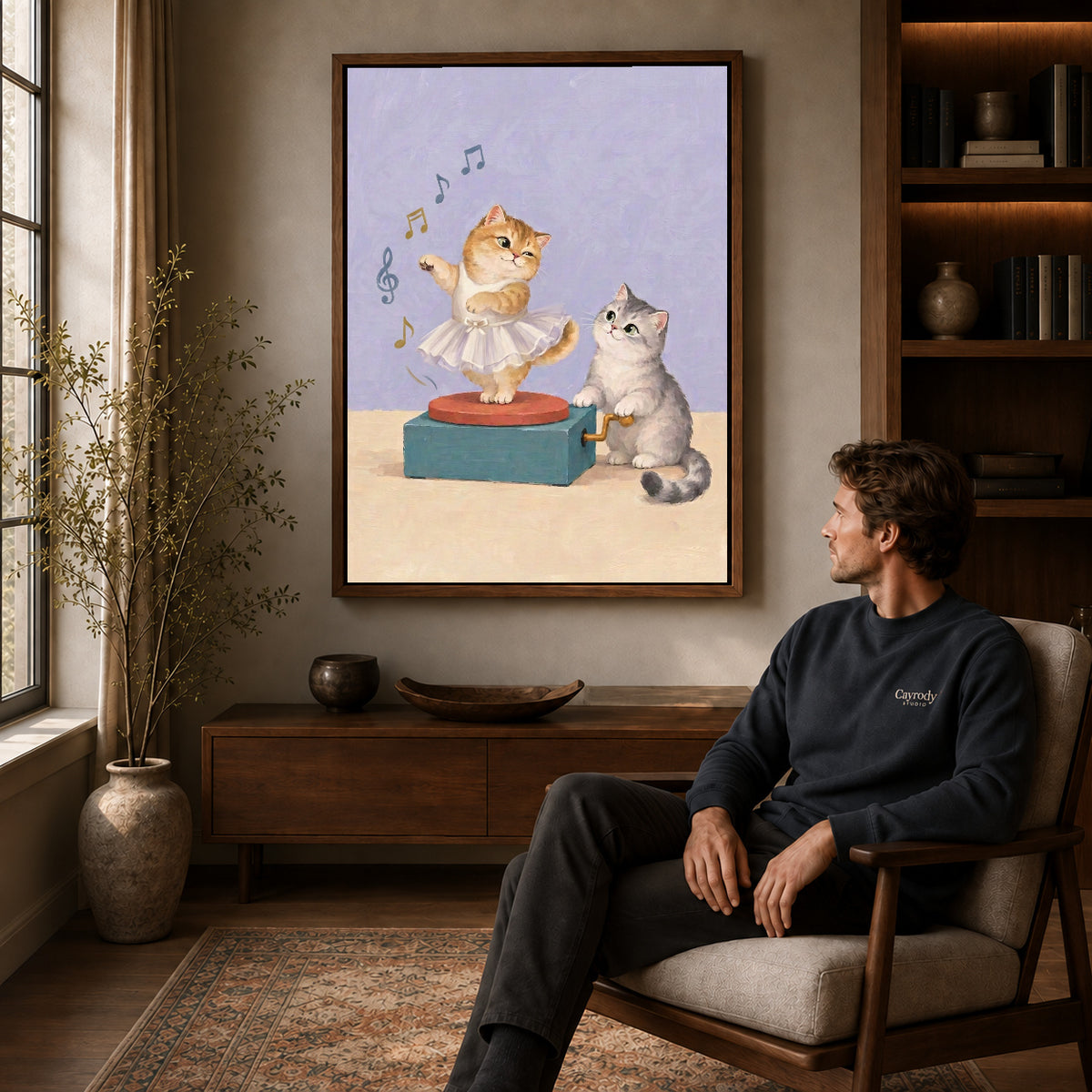Walnut framed music box kittens artwork above a seated man in a wood furnished living room.