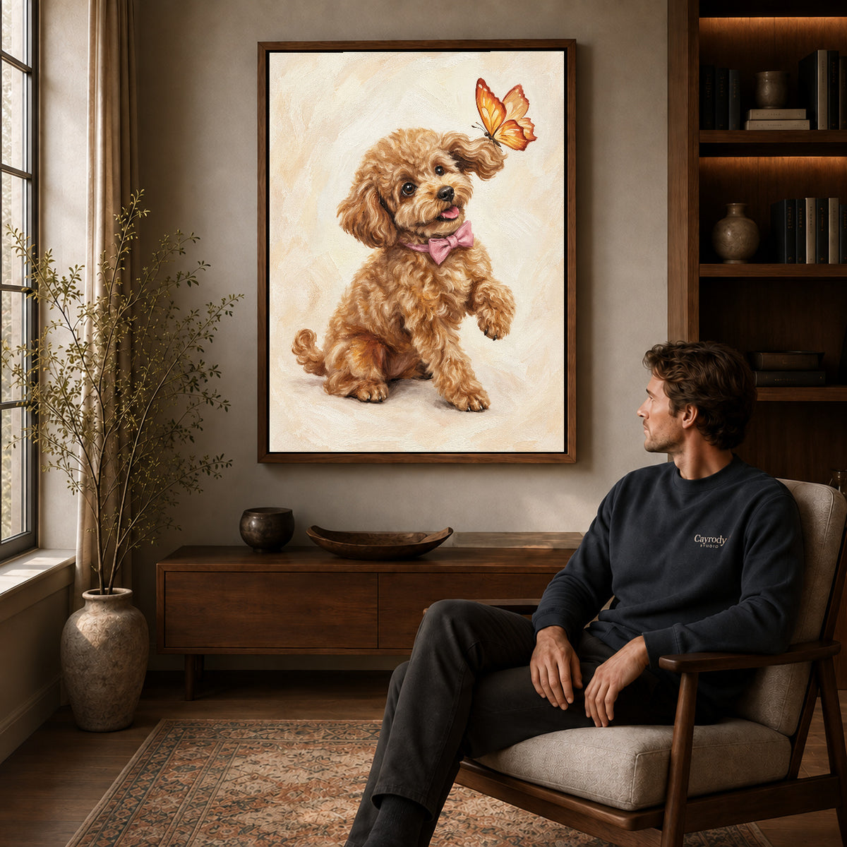 Walnut framed poodle butterfly friend artwork above a seated man in a wood furnished living room.