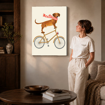 Gallery wrapped bicycle dachshund artwork with shaded canvas edges beside a woman wearing cream clothing.