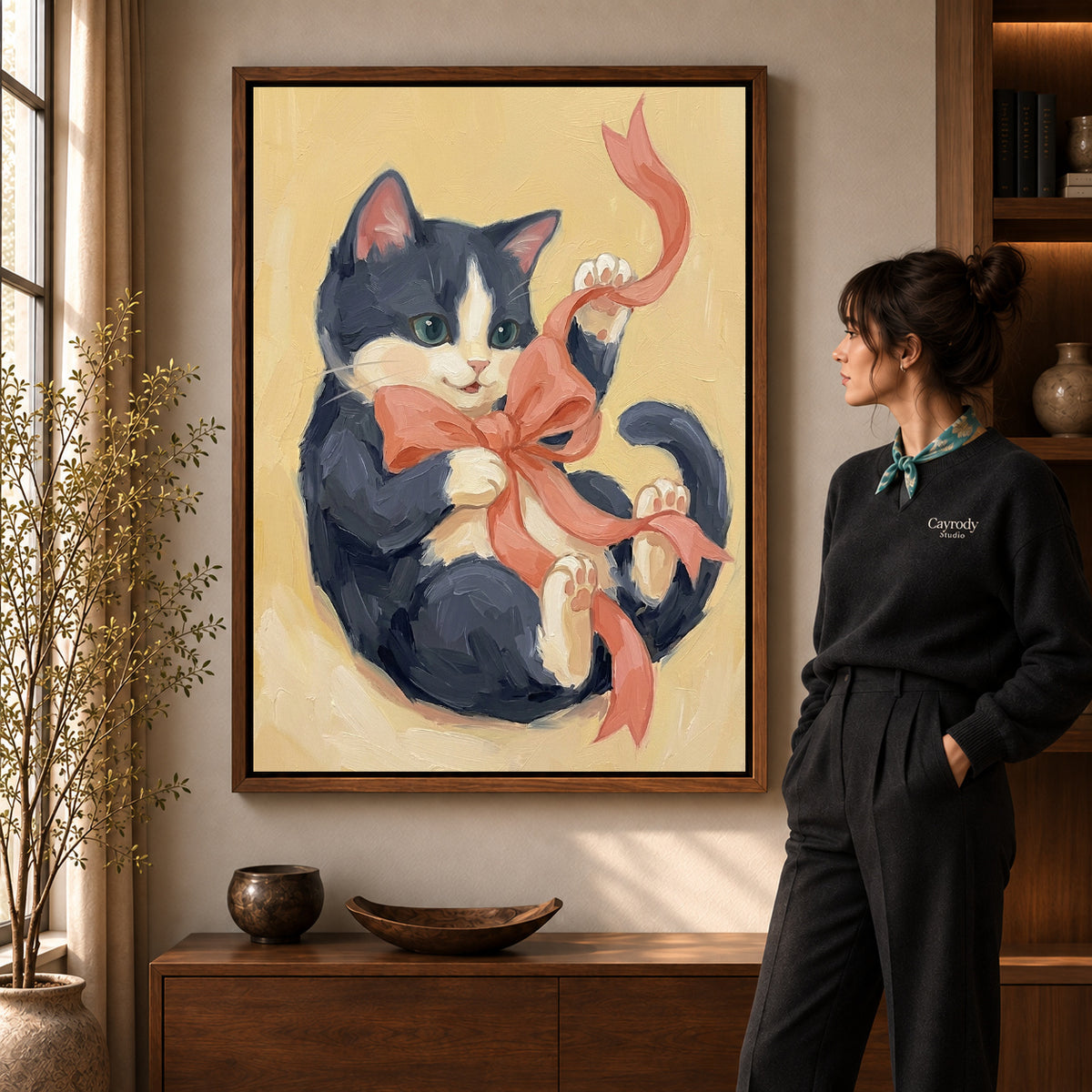 Walnut framed ribbon playing kitten artwork scene assigned to all six walnut framed canvas sizes.