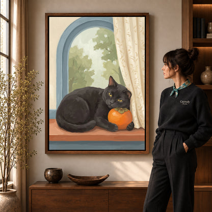 Persimmon Window Cat artwork in a walnut frame beside a standing woman in a warm room.