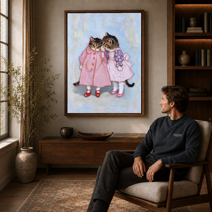 Walnut framed pink dress kitten friends artwork above a seated man in a wood furnished living room.