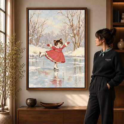 Winter Skating Kitten artwork in a walnut frame beside a standing woman in a warm room.