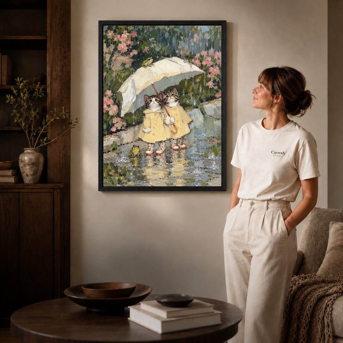 Black framed raincoat kitten friends artwork scene assigned to all six black framed canvas sizes.