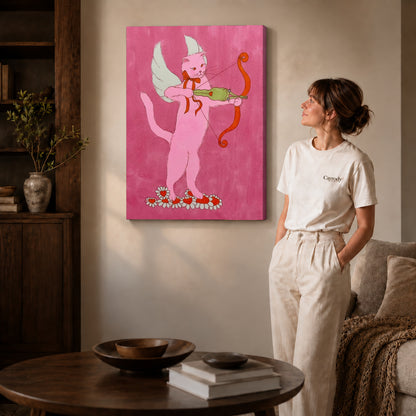 Gallery wrapped cupid archer cat artwork with shaded canvas edges beside a woman wearing cream clothing.