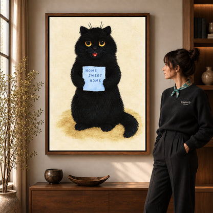Home Sweet Cat artwork in a walnut frame beside a standing woman in a warm room.